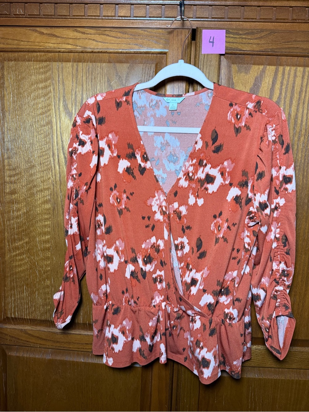 Rust Floral Wrap Blouse with Peplum Hem